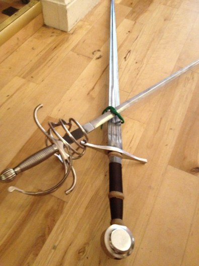The longsword and the rapier...and our newly earned green cord! 