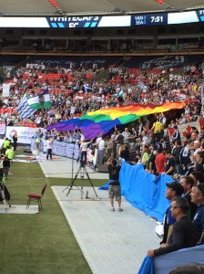 Southsiders whipping out Vision Vancouver's rainbow flag at the beginning of the game. 